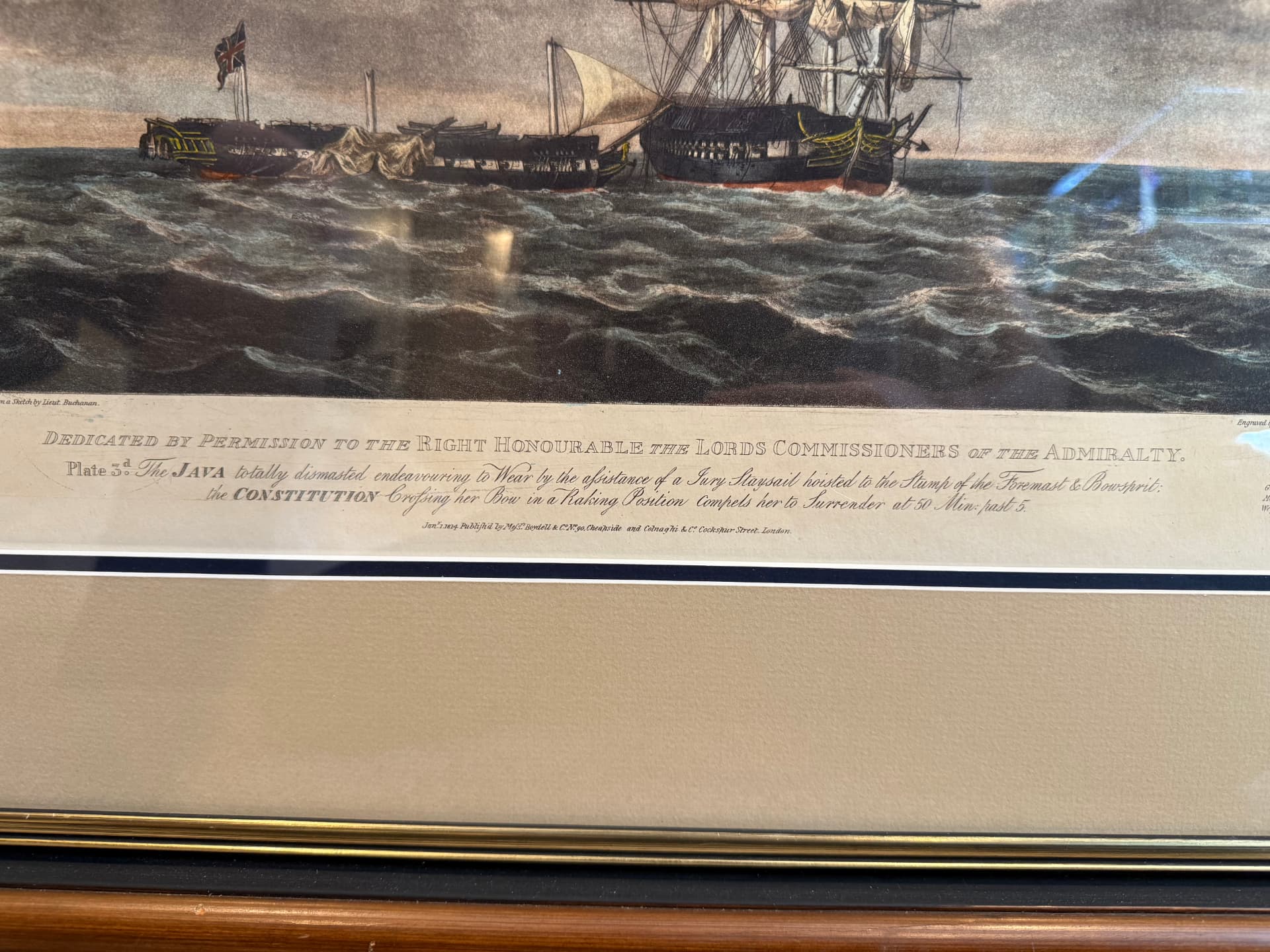 Detail of the lettering and publication line below the image